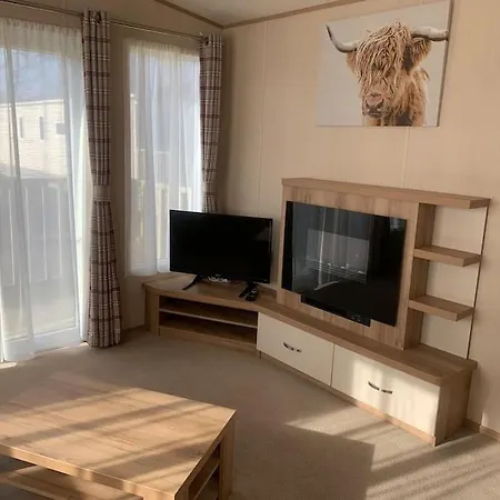 Casa vacanze Woodpecker Lodge, Camelot Park, Ca6 5sz *